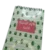 Couverture avant d'un carnet de notes à spirale avec un motif de pastèques vertes et un titre en arabe "Al-Ayam Al-Jamila Qadima" sur fond rose.