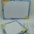 Ensemble de papeterie motif citrons comprenant un tableau blanc magnétique vide, un bloc-notes quadrillé et une checklist de lecture du Coran.