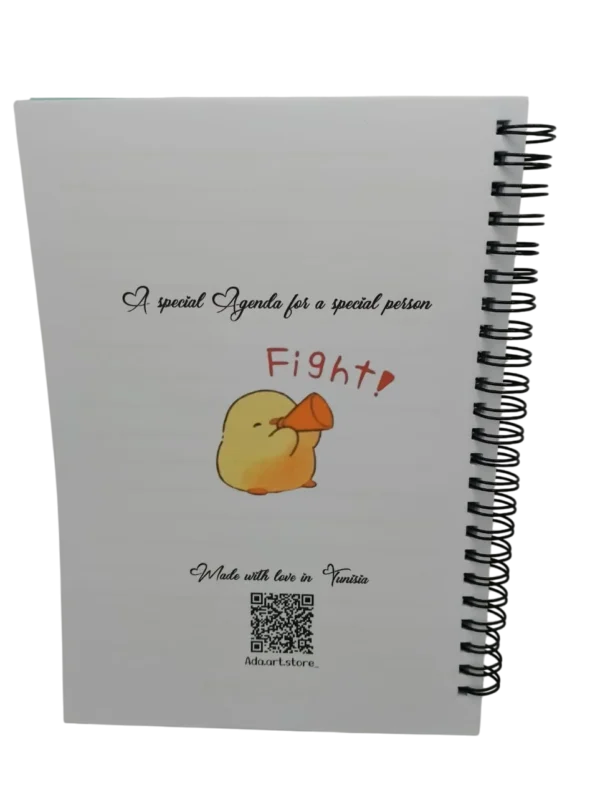 Dos du cahier avec inscription "Made with love in Tunisia" et "A special Agenda for a special person".